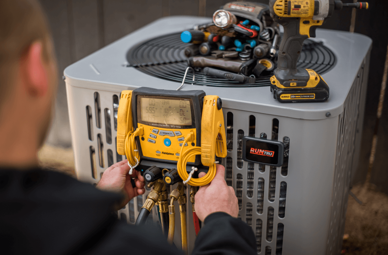 Technician Performing AC Tune-Up