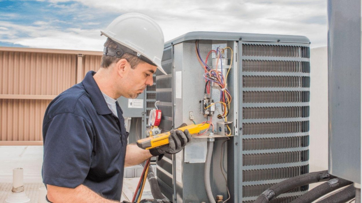 HVAC technician repairs a Trane unit in Atlanta, GA. Expert service for top Trane models. Ensuring optimal performance and efficiency.